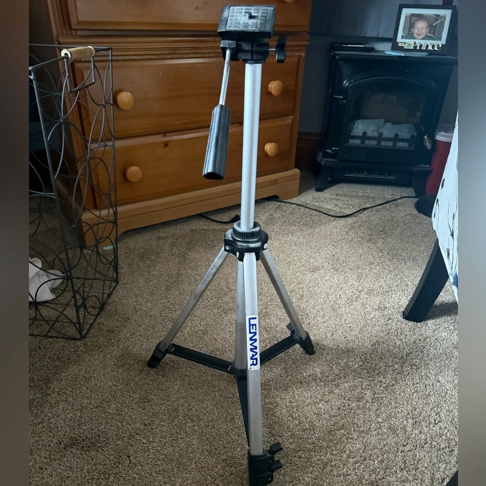 Silver and Black Tripod with Telescoping Legs and Quick-Release Locks